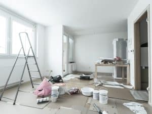 a messy room being renovated by using painting techniques to transform the room