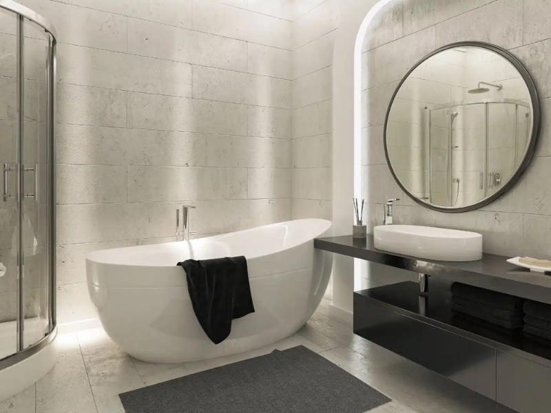 Sleek bathroom design featuring a freestanding tub, fresh bathroom painting, and soft lighting.