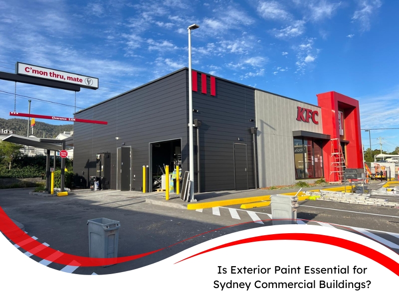 Recently repainted KFC commercial building in Sydney featuring dark grey and red exterior paint with drive-thru area visible