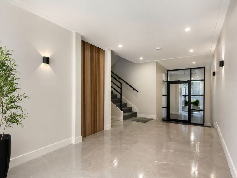 Freshly painted apartment lobby interior with smooth walls and clean trim
