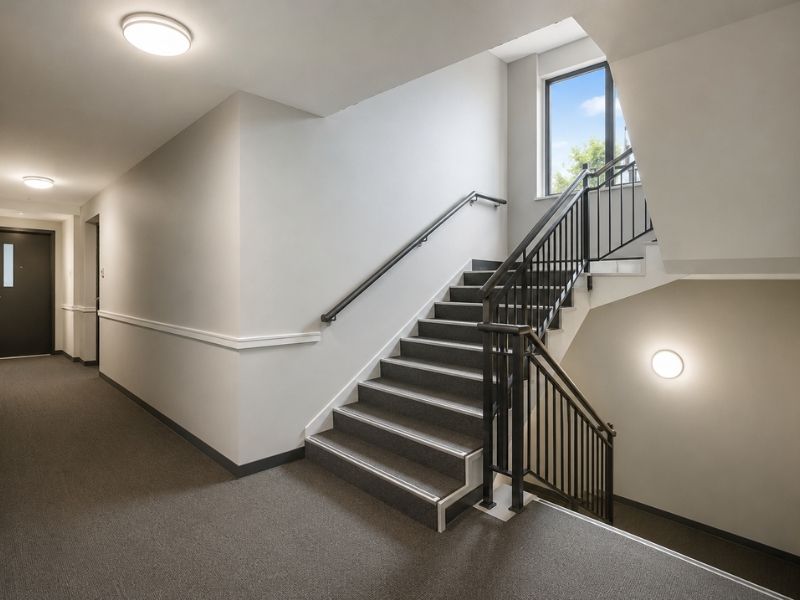 Repainted common area stairwell and hallway in a Sydney apartment complex